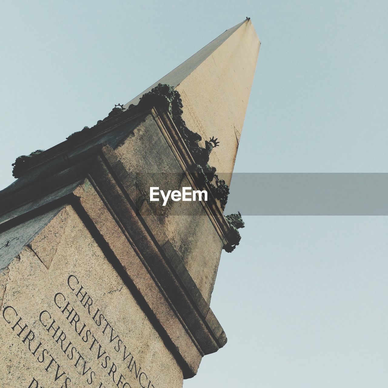 Low angle view of tower in piazza san pietro against clear sky