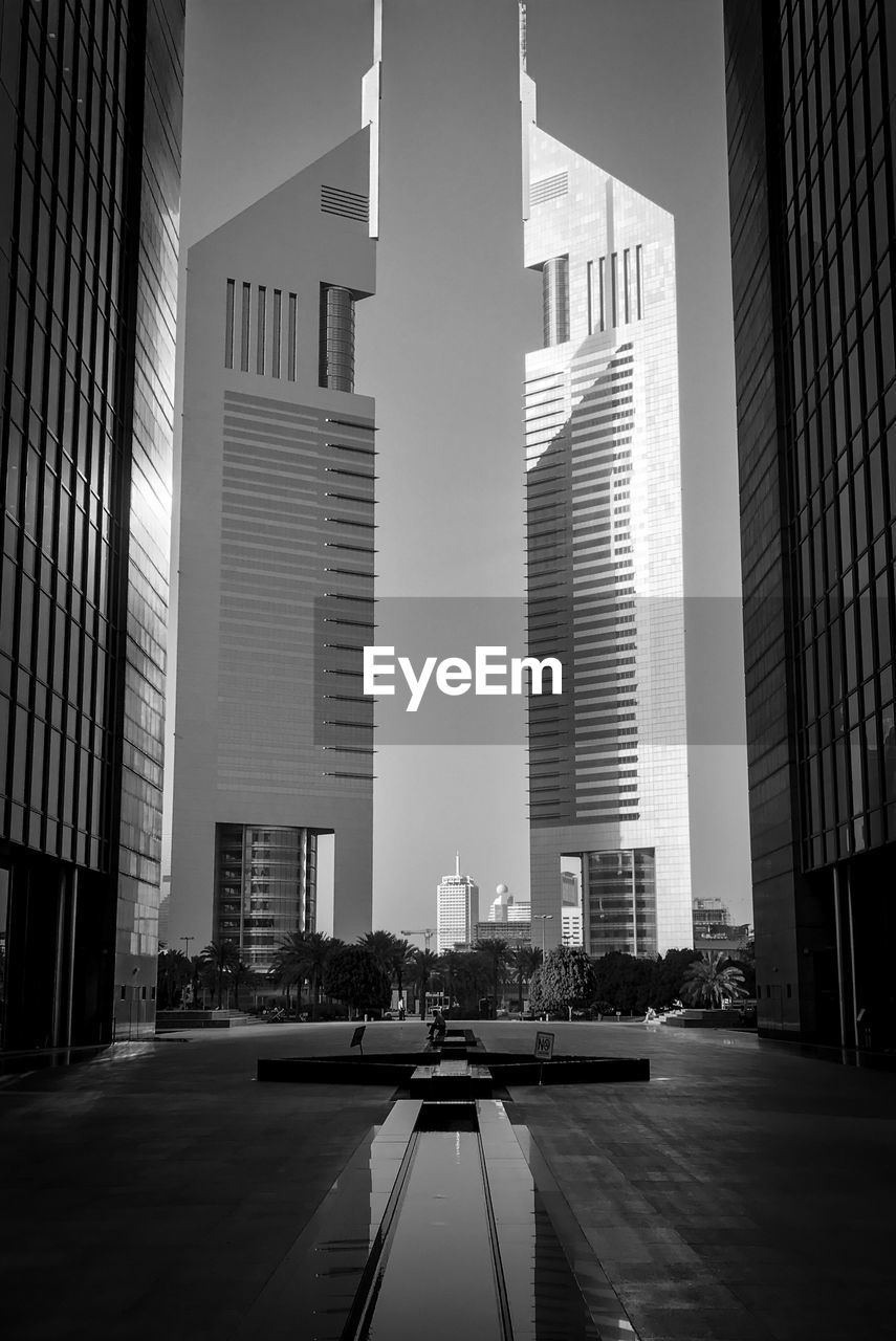 Modern city skyline against clear sky