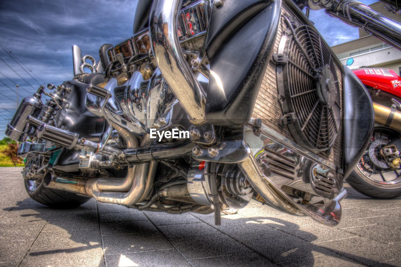 CLOSE-UP OF BICYCLES ON STREET