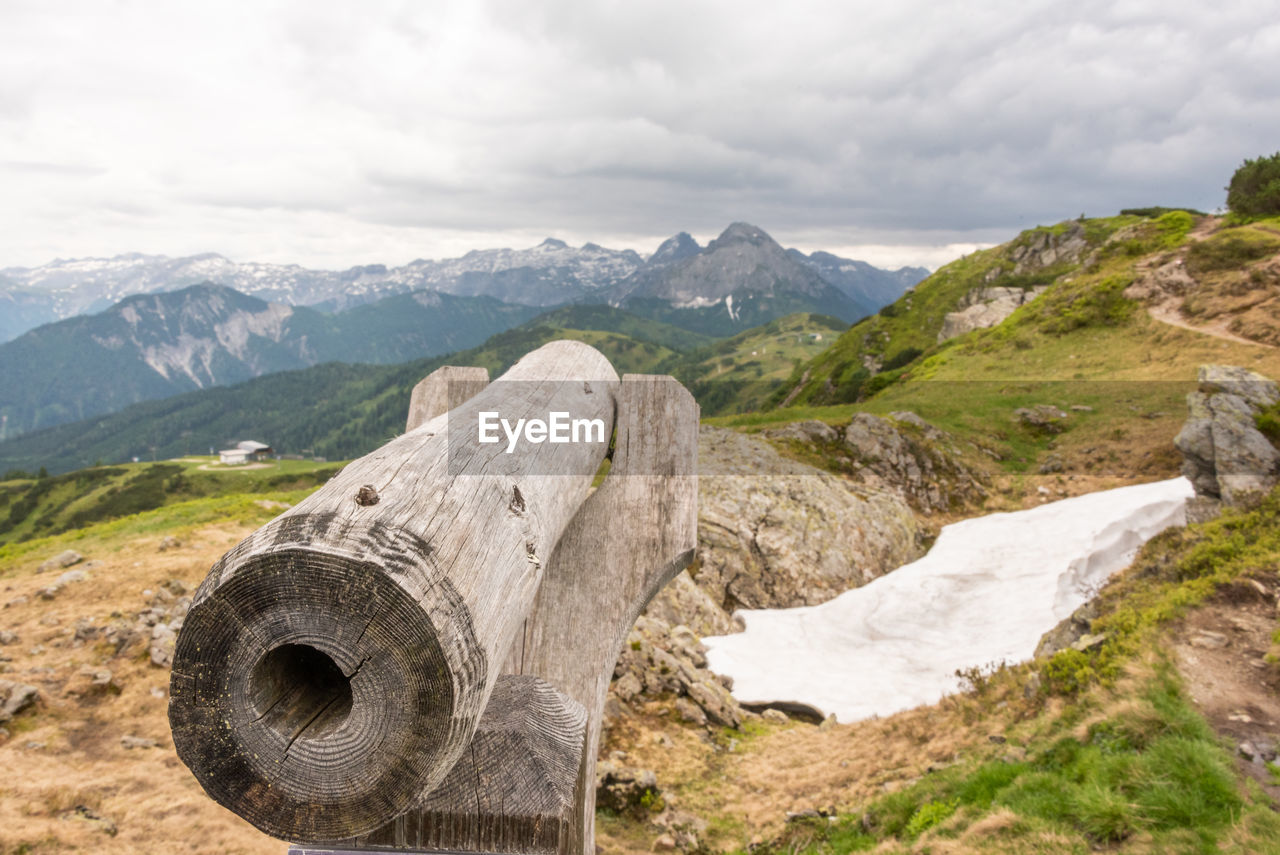 A wooden telescope for observing the top of the mountain. hiking trail in austria. flachau