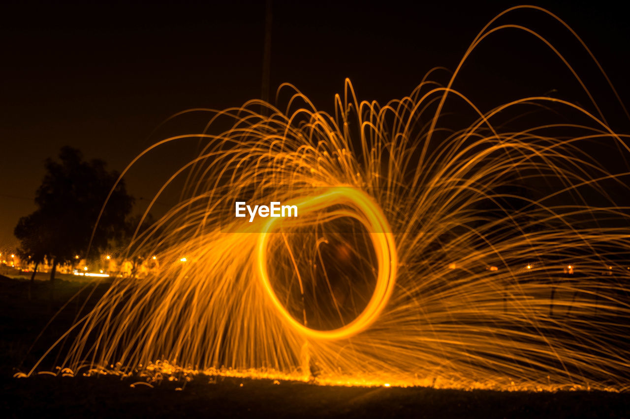 Wire wool at beach during night