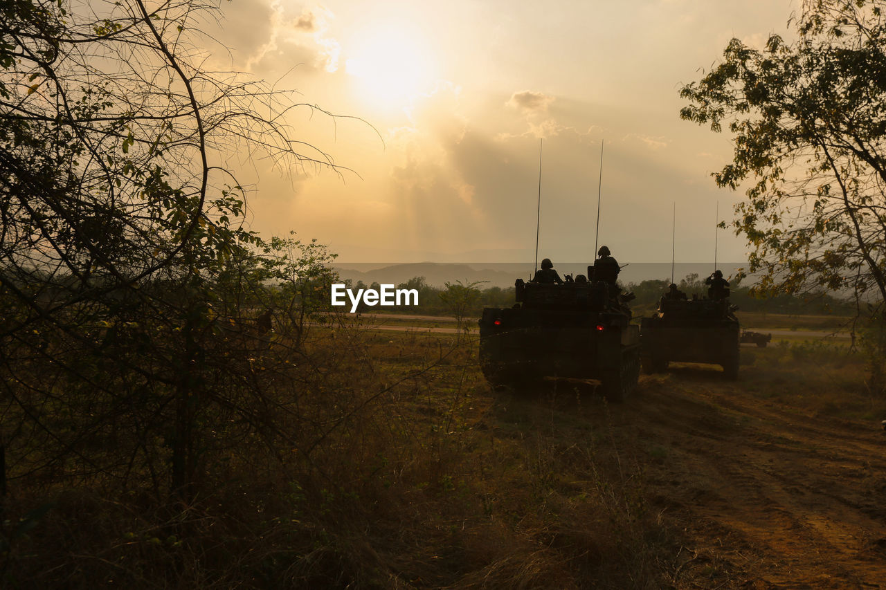 SCENIC VIEW OF FIELD DURING SUNSET