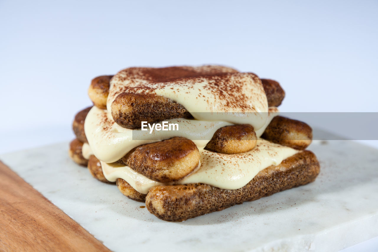 CLOSE-UP VIEW OF BREAD WITH CHOCOLATE CAKE