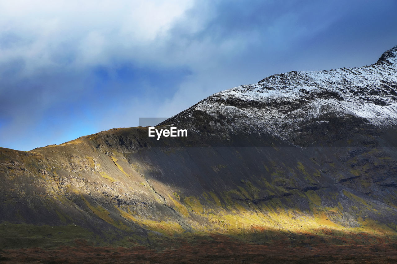 Close-up of mountain against sky