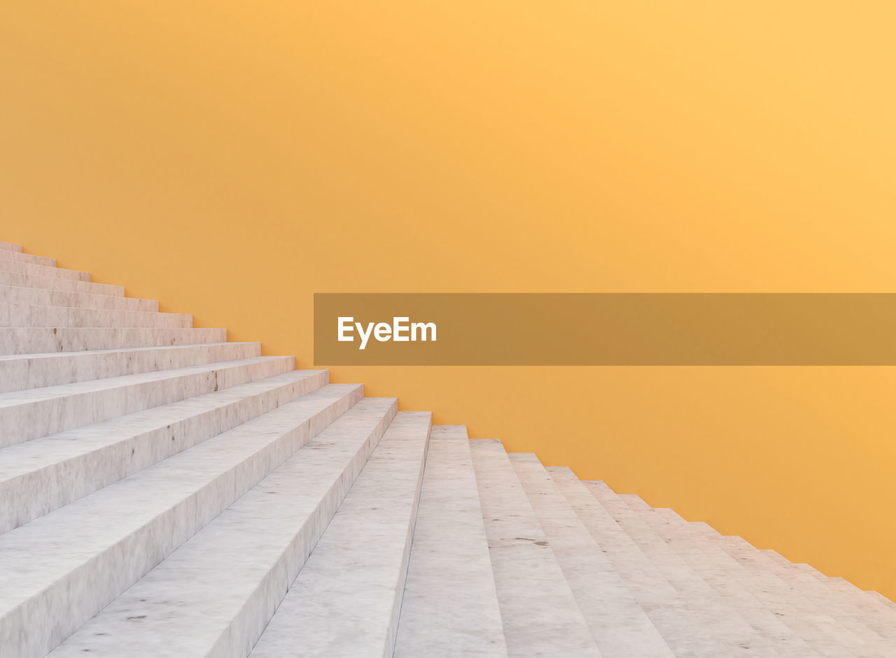 Minimal concrete staircase and yellow wall , 3d rendering