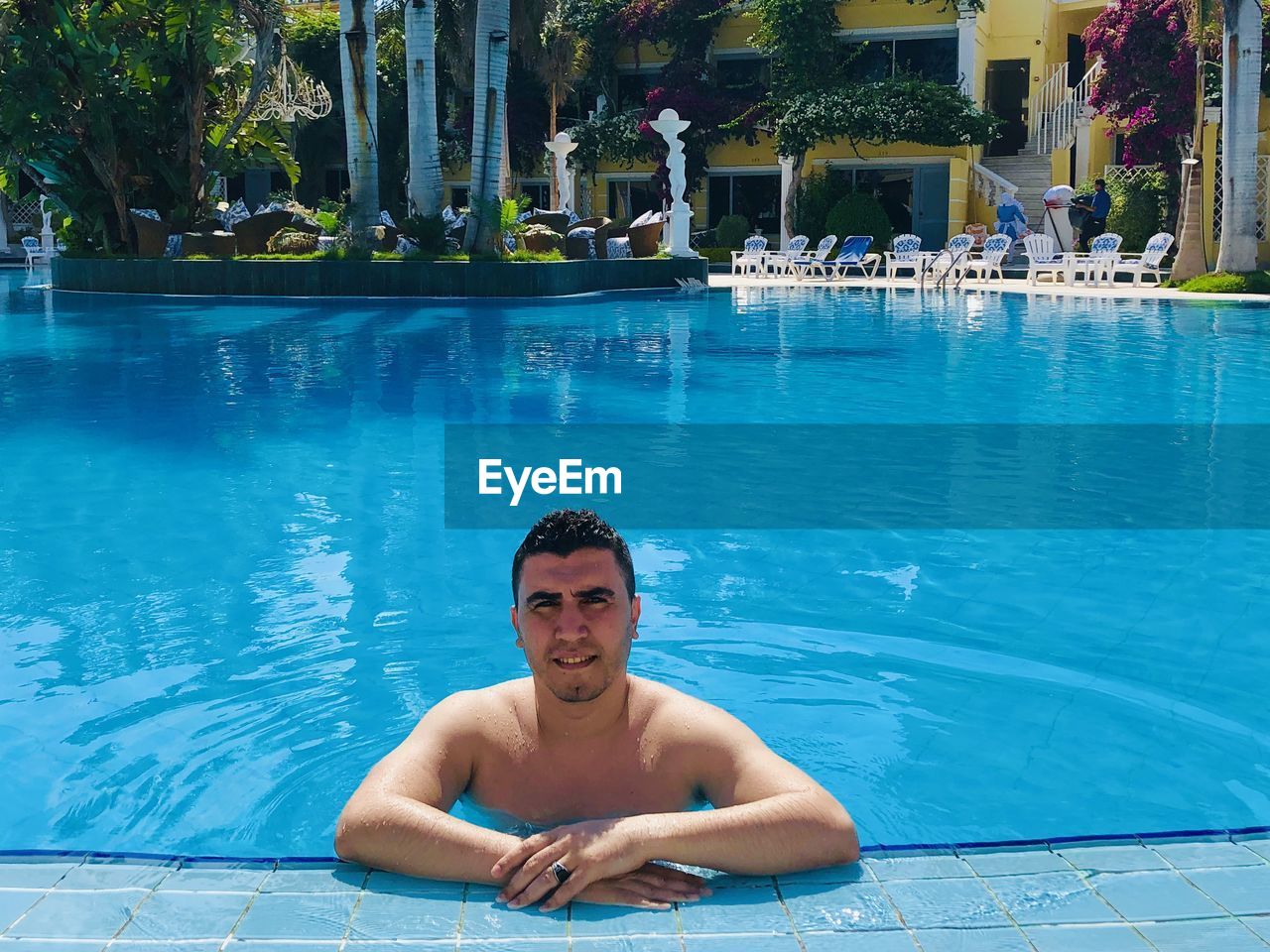 Portrait of man in swimming pool