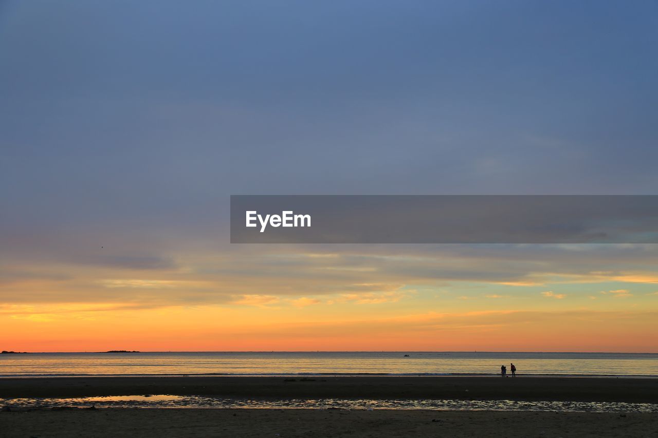 Scenic view of beach during sunset