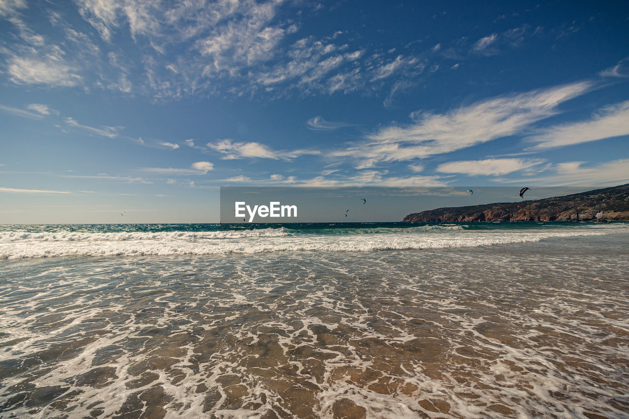 Scenic view of beach against sky