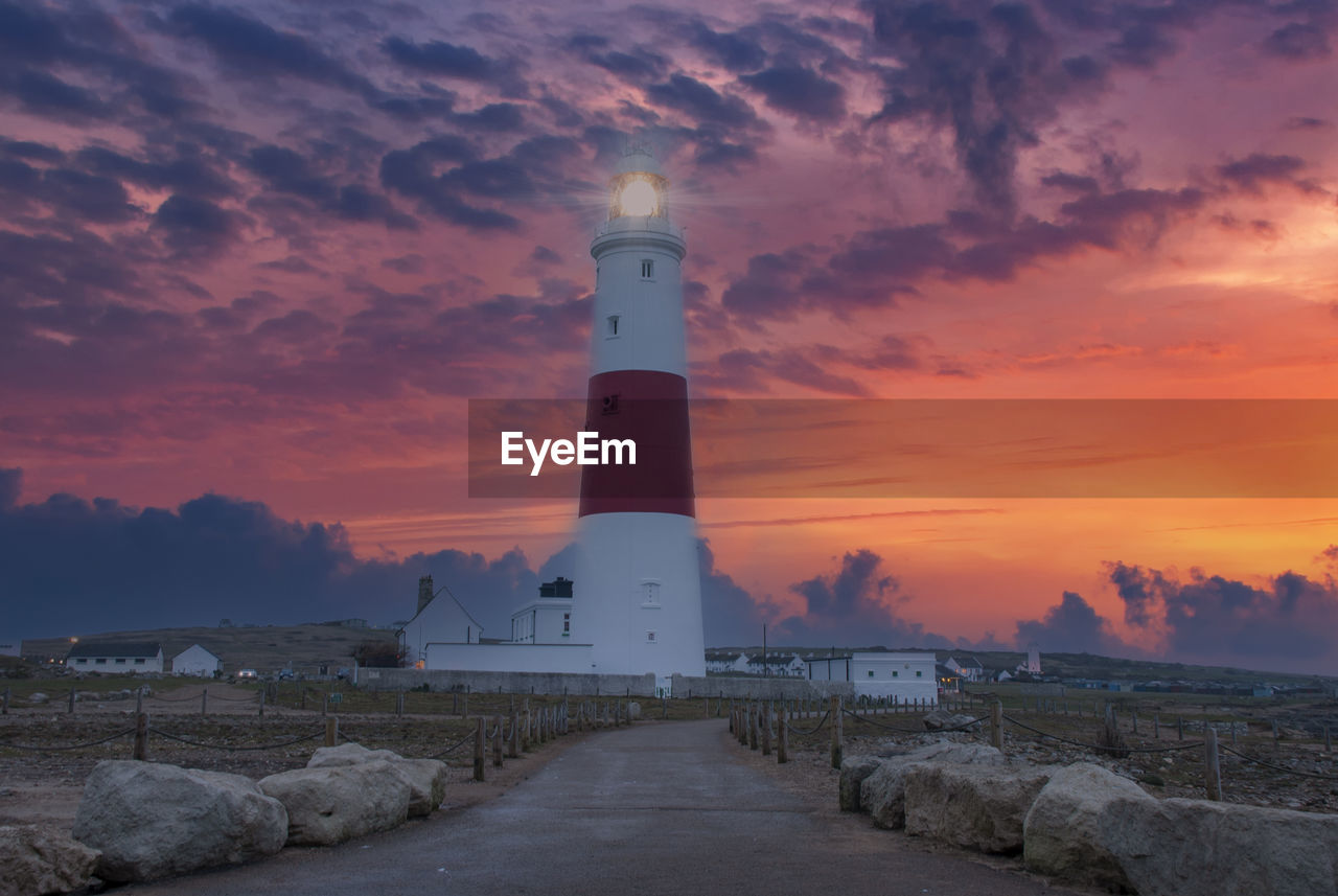 A dramatic sunset at the portland bill lighthouse on the south coast of england in dorset