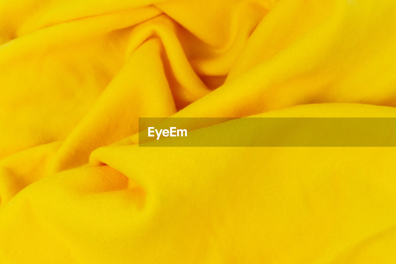 Full frame shot of yellow textile