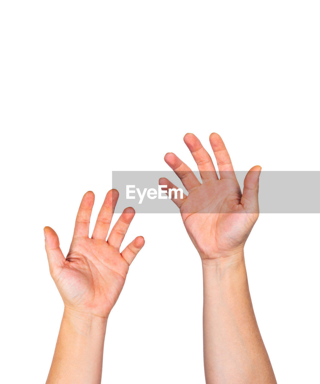 Close-up of cropped hands gesturing against white background