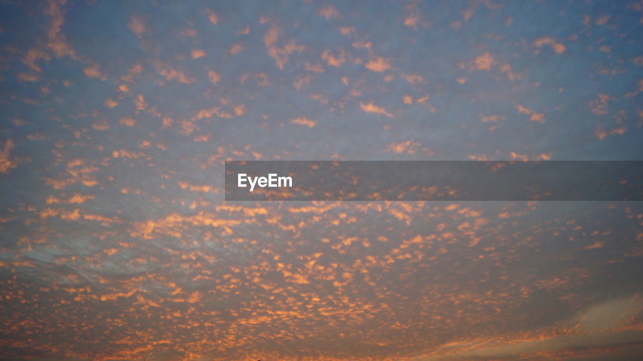 LOW ANGLE VIEW OF CLOUDY SKY DURING SUNSET