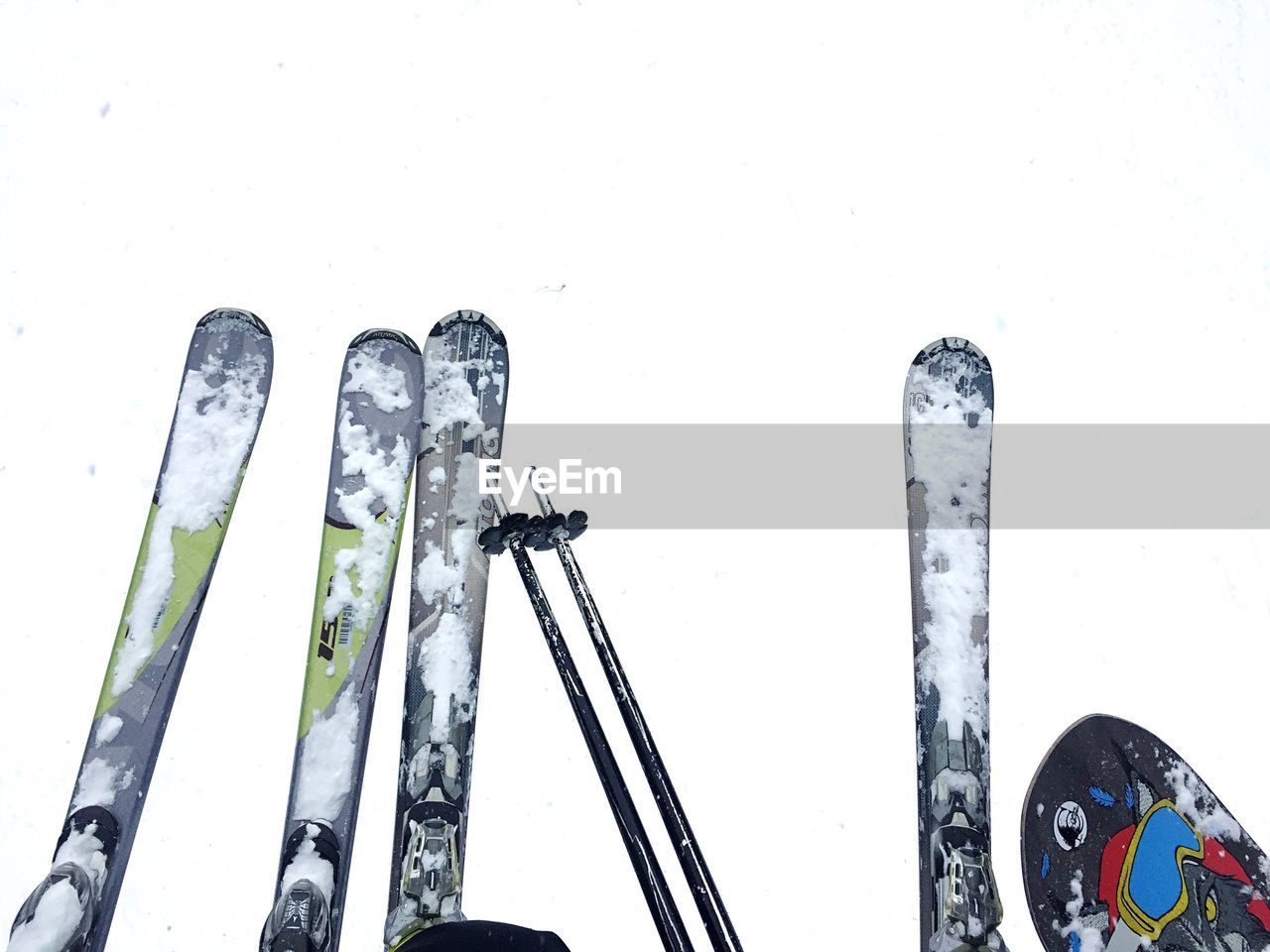 HIGH ANGLE VIEW OF METALLIC STRUCTURE ON SNOW