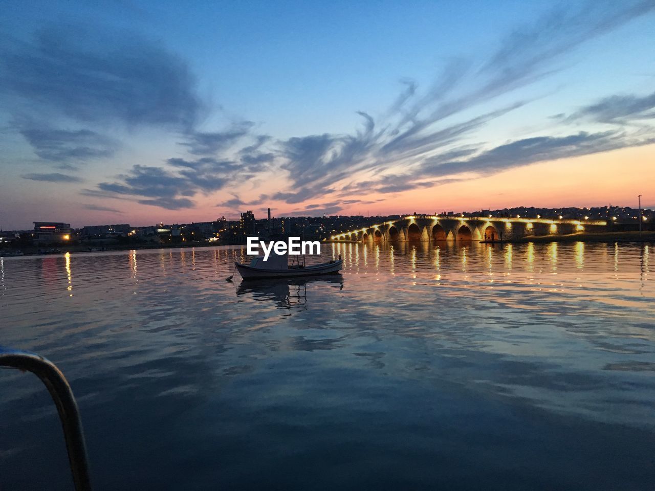 SCENIC VIEW OF SUNSET OVER MARINA