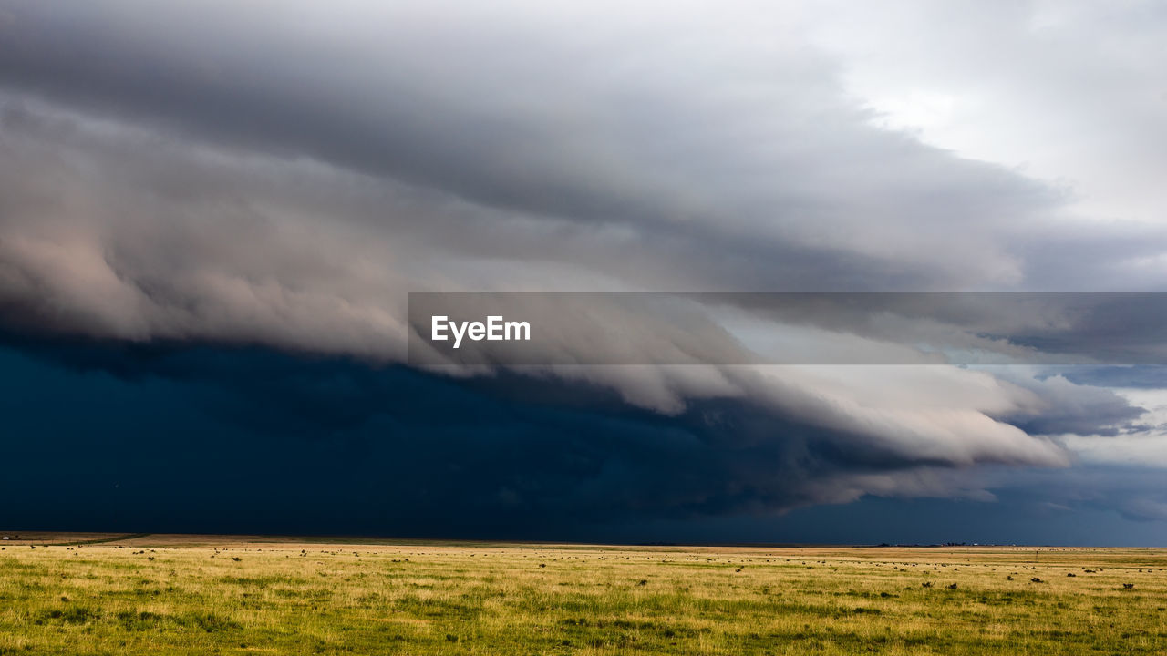 A dramatic arcus cloud leads a line of thunderstorms across southeastern colorado.