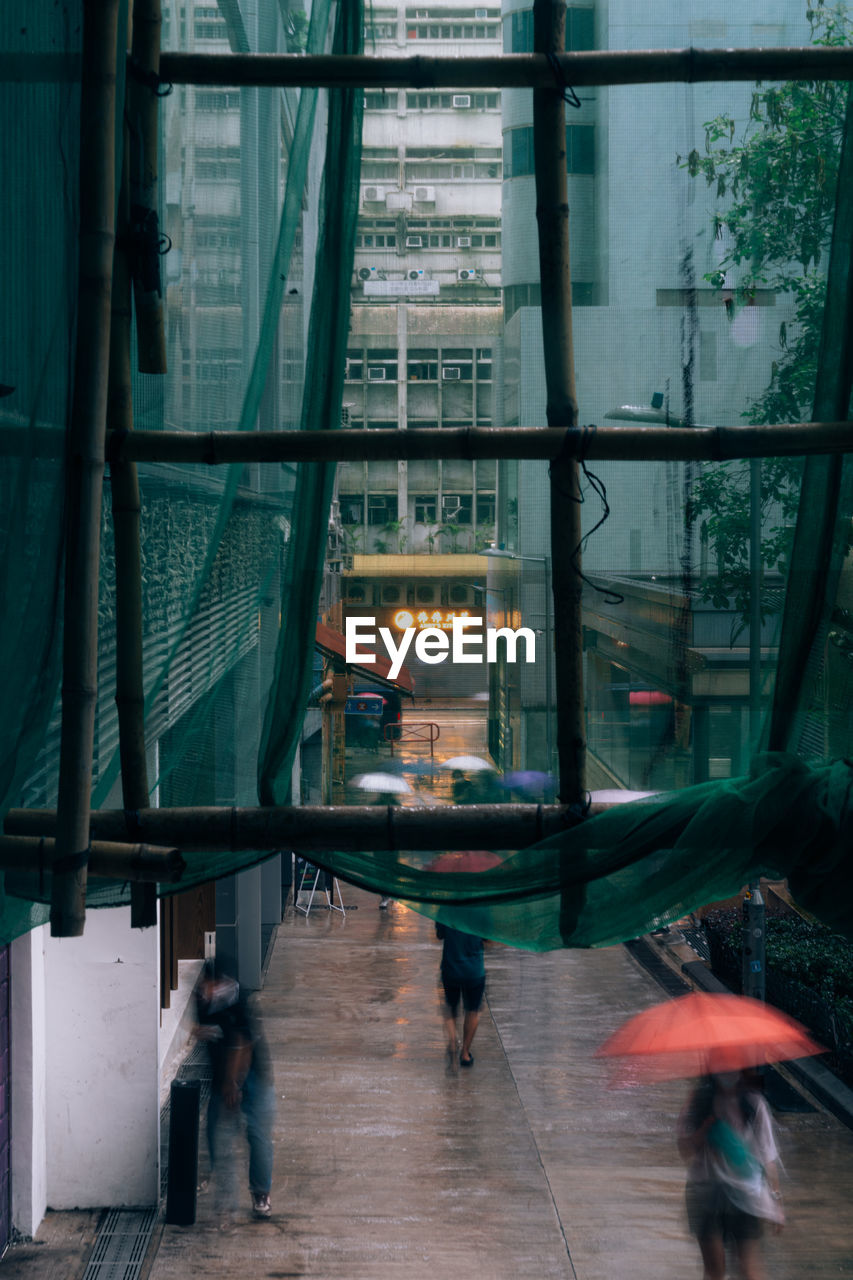 Moving with umbrella