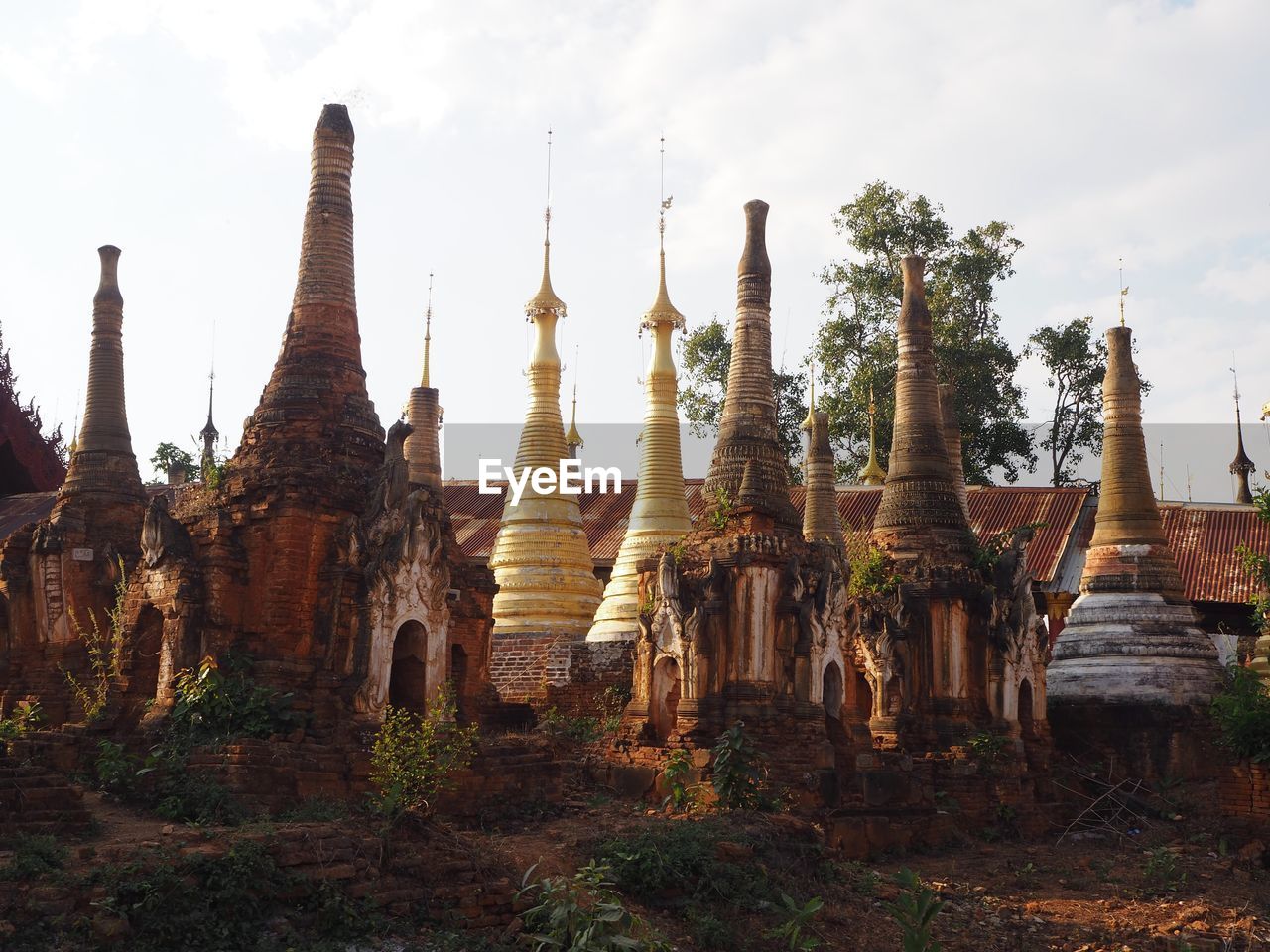 EXTERIOR OF TEMPLE AGAINST BUILDINGS