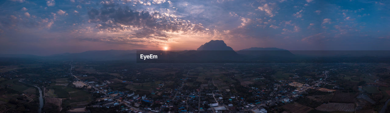 High angle view of townscape against sky at sunset