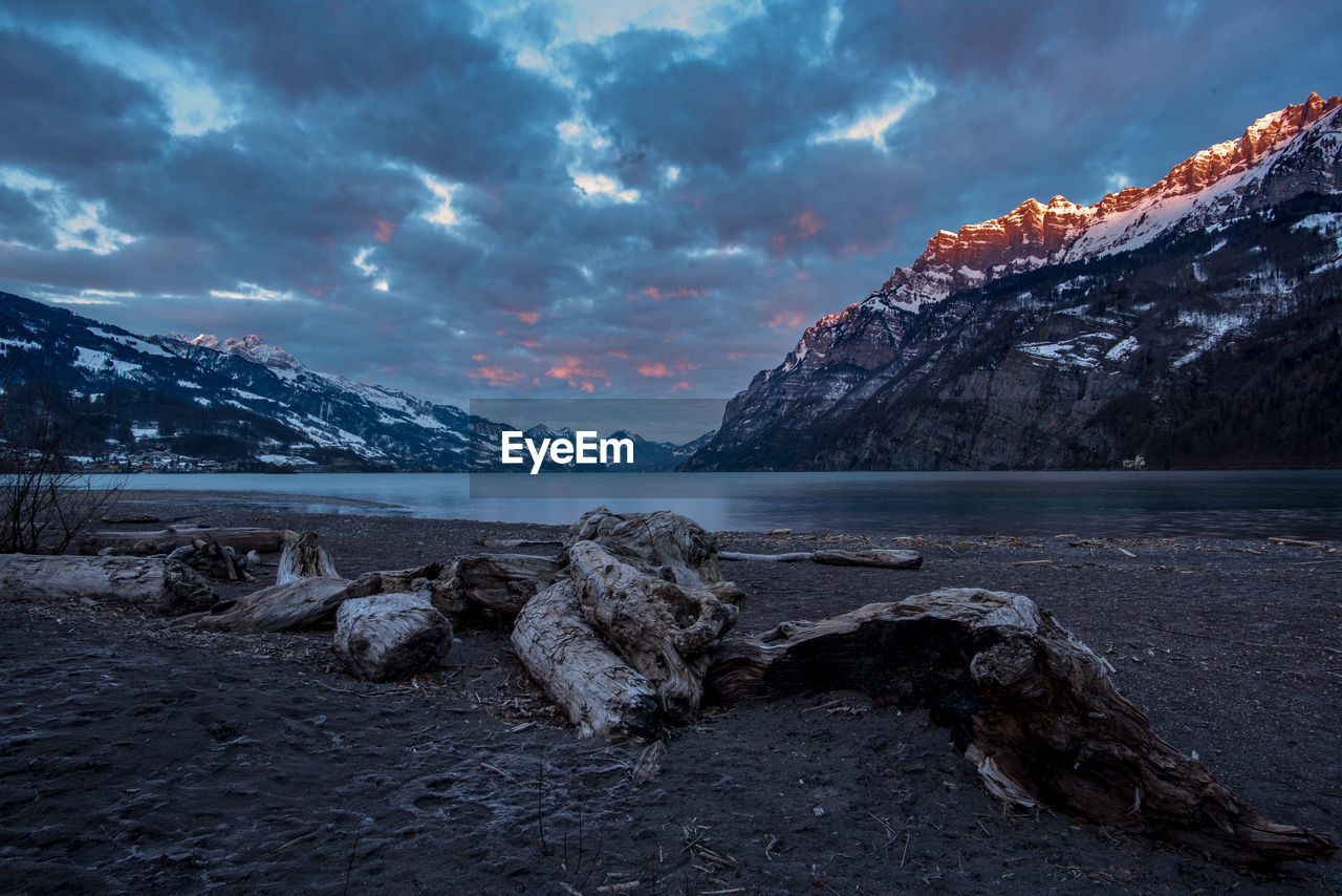 Scenic view of snowcapped mountains against sky