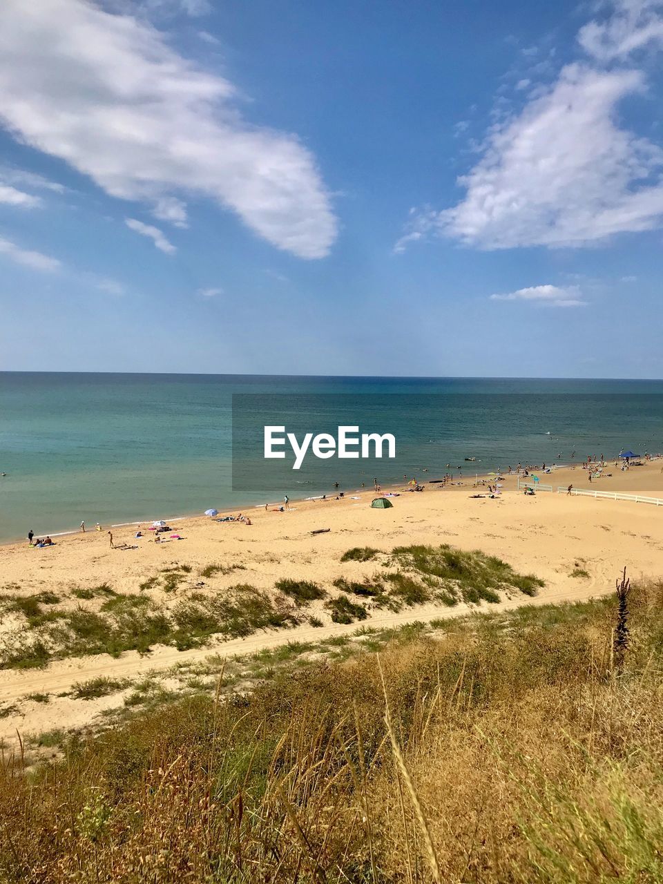 Scenic view of beach against sky