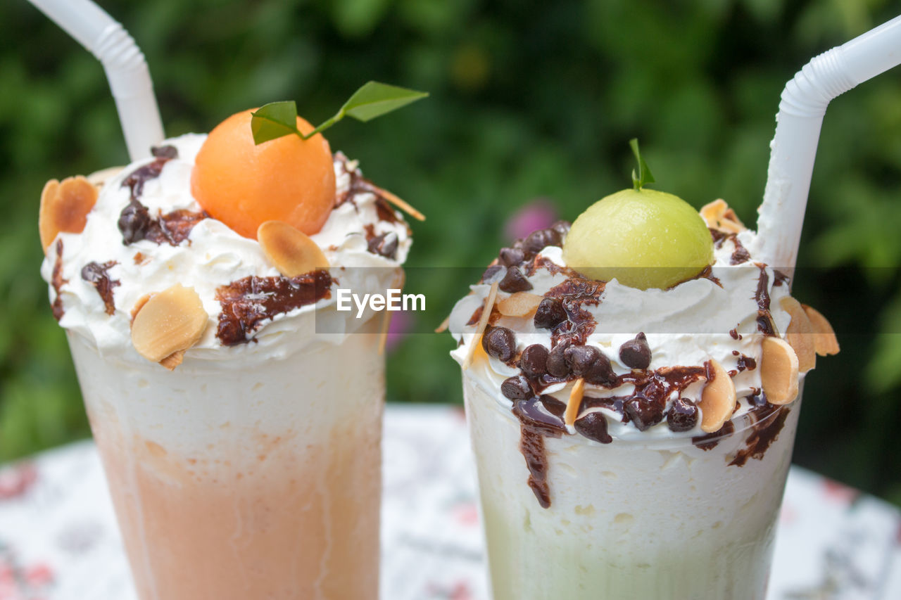 Close-up of ice cream sundae on table