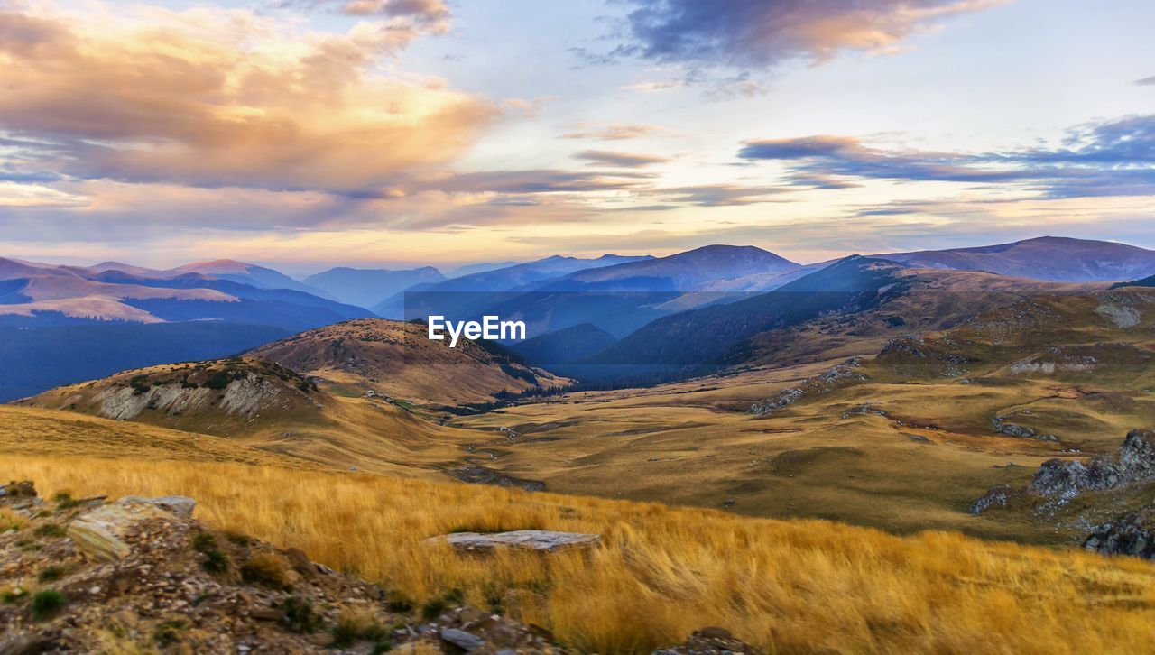 View of a valley with mountains in the background