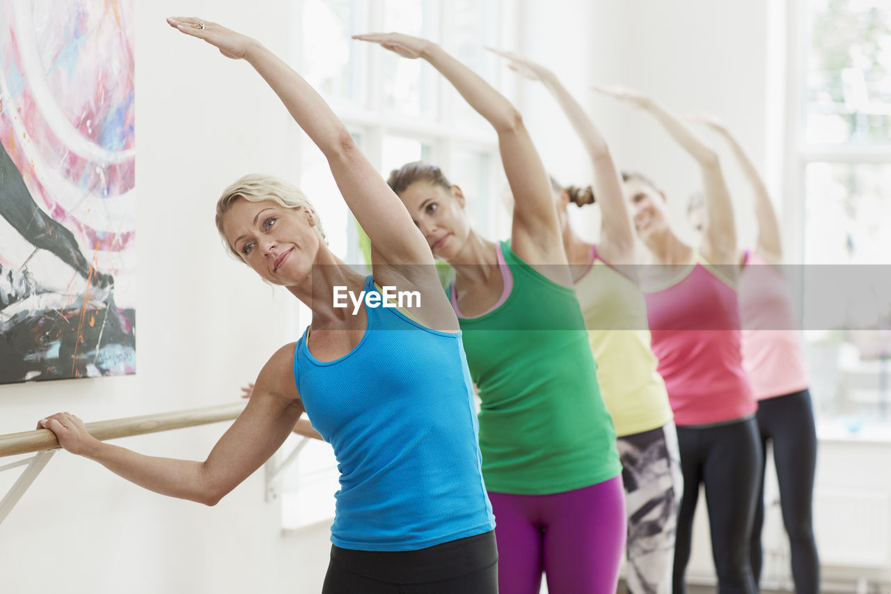 Women training ballet in dance studio