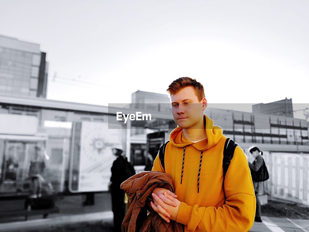 Young man against sky during winter