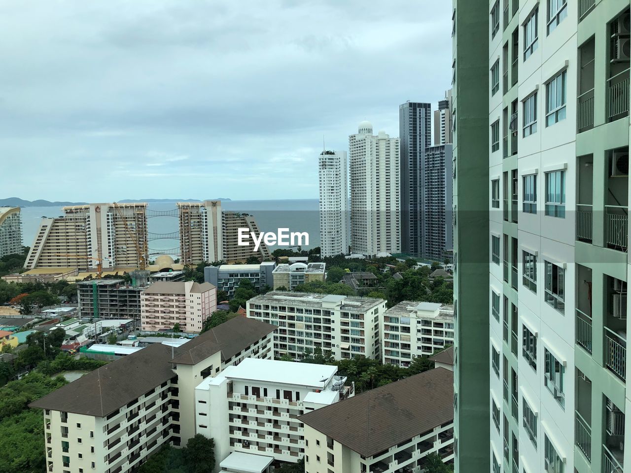 MODERN BUILDINGS AGAINST SKY IN CITY