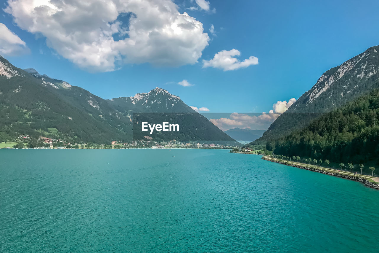 Huge mountain blue lake. untouched wildlife of europe. majestic mountains covered with trees 