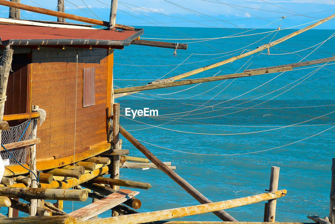 TILT IMAGE OF SHIP AGAINST SEA