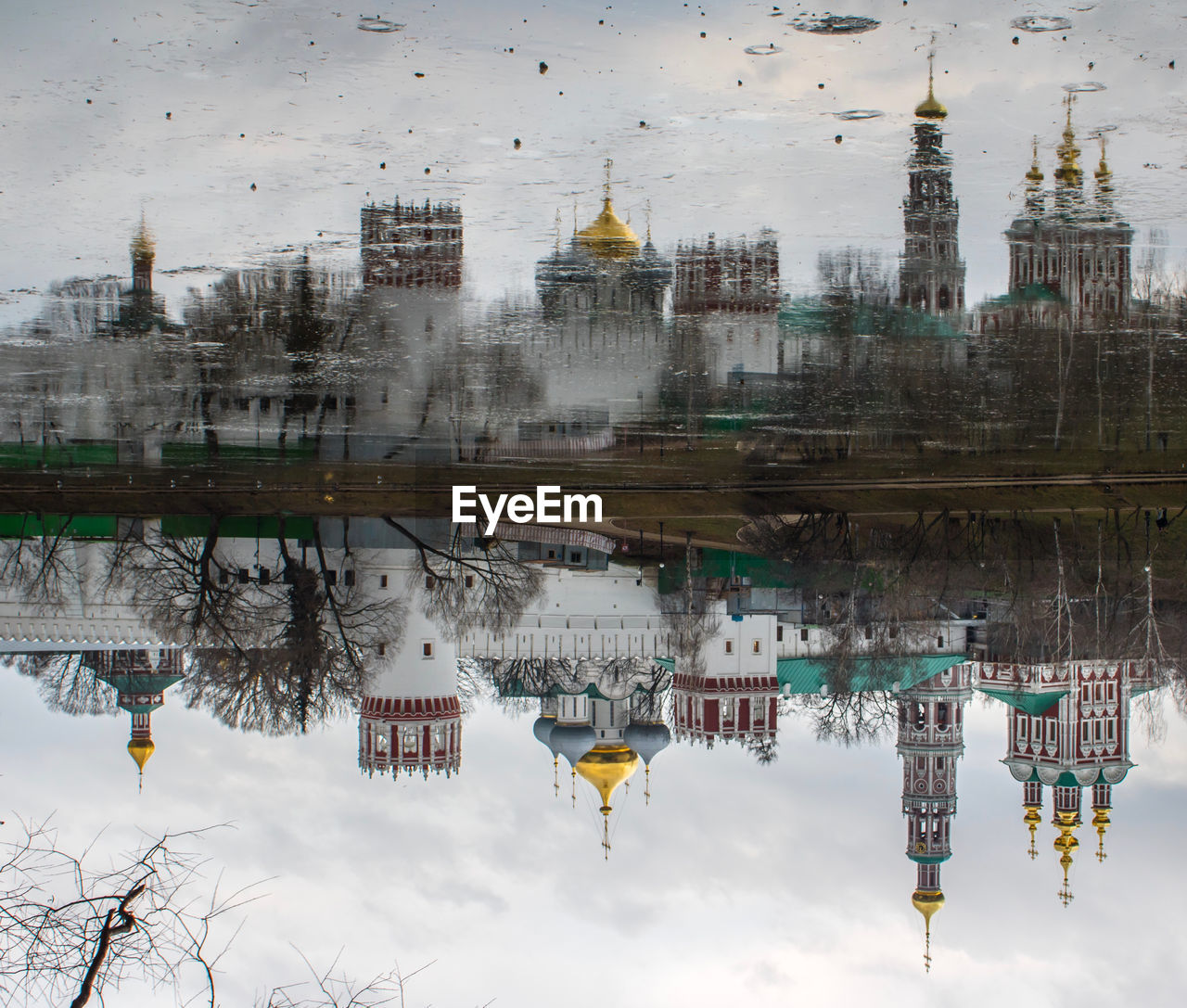 REFLECTION OF BUILDINGS IN CANAL