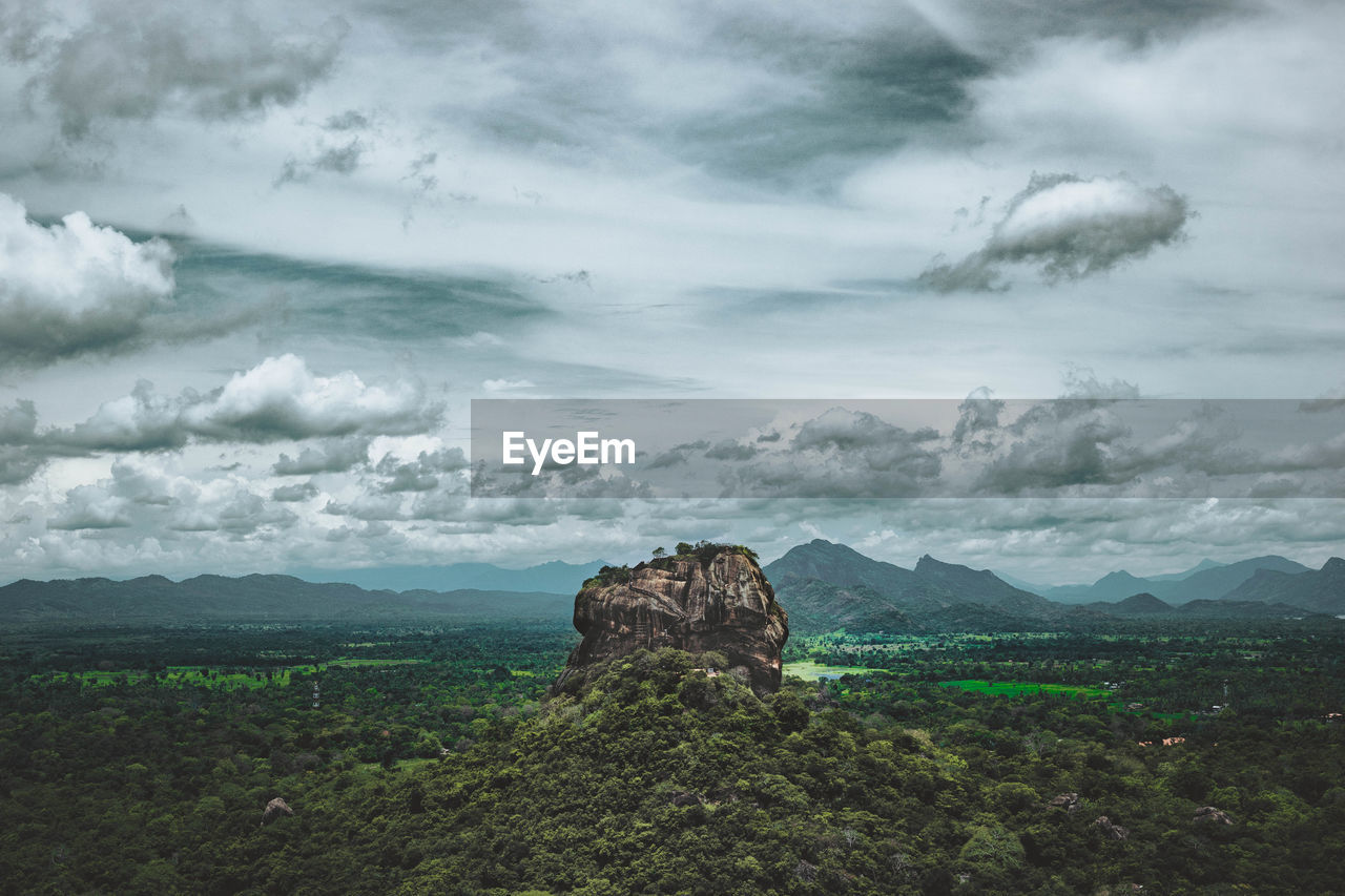 Scenic view of land against sky