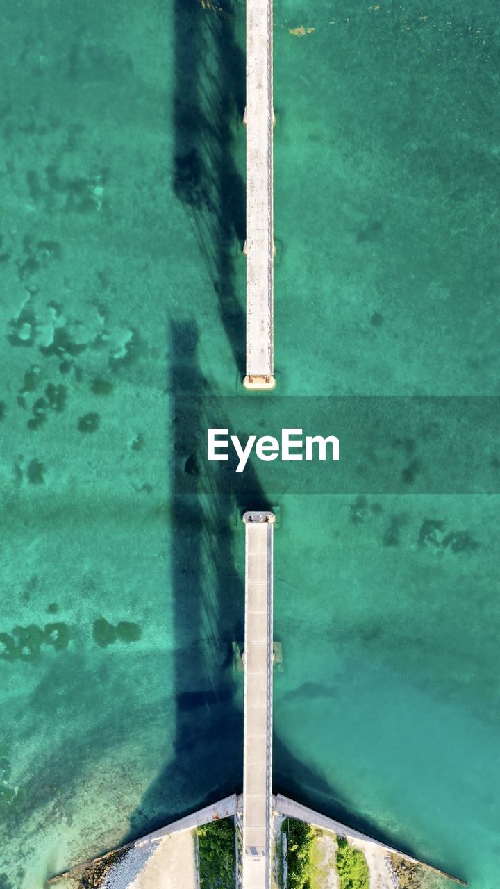 HIGH ANGLE VIEW OF SWIMMING POOL ON PIER