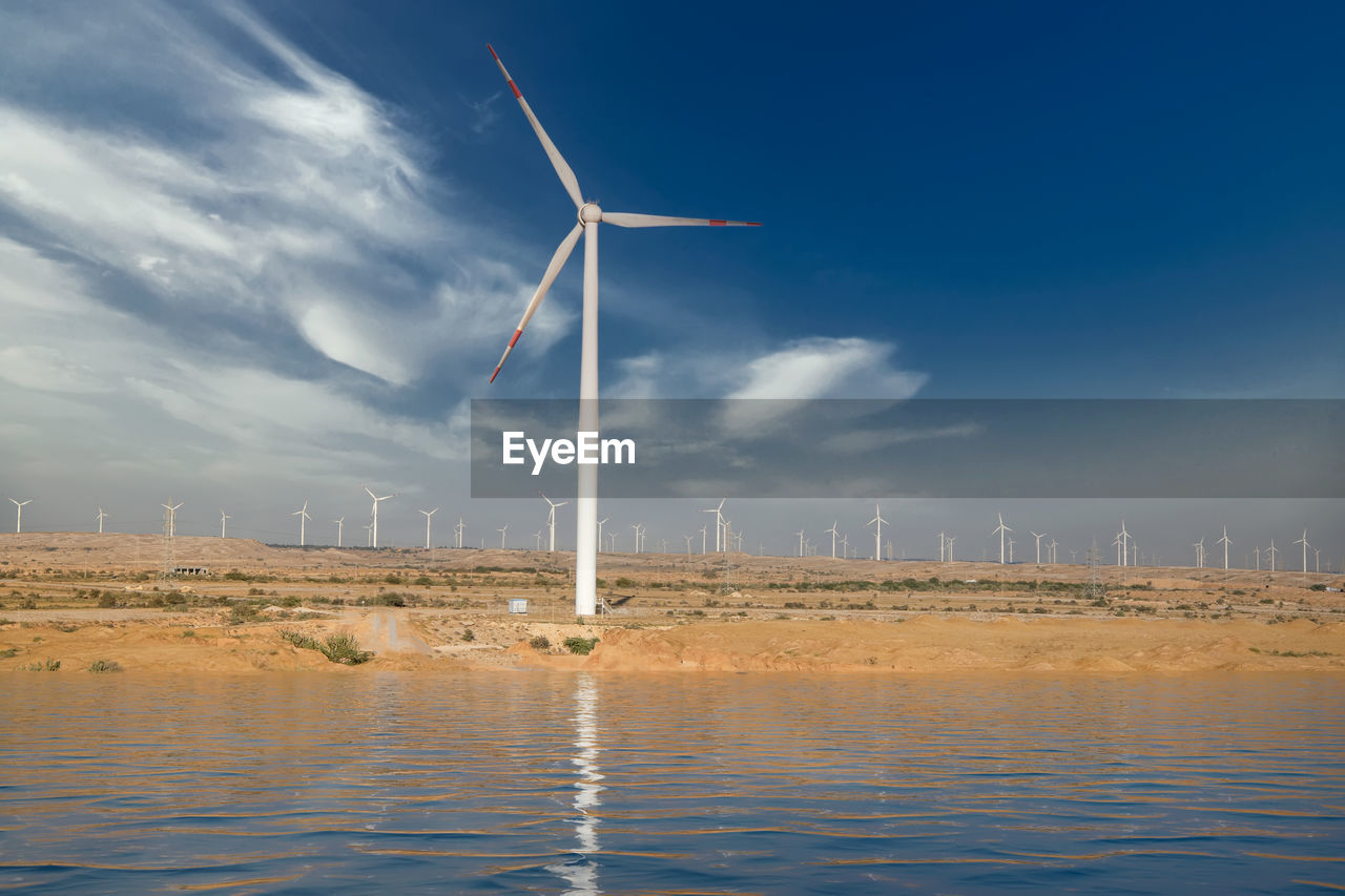 View of wind power plant. vast turbine wind mills farm at jhimpir