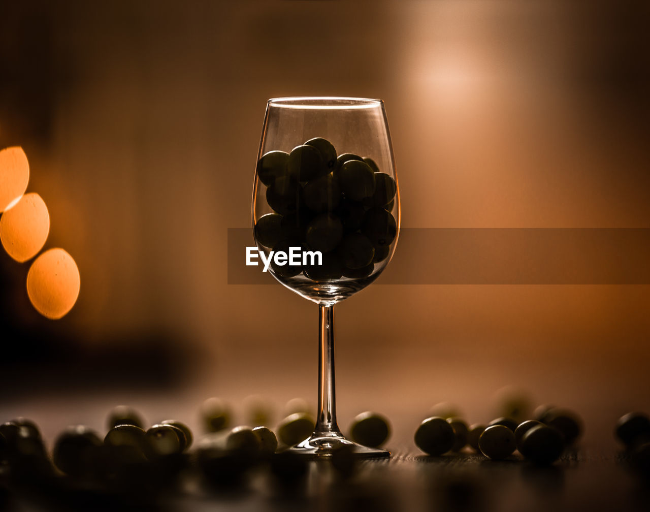 Close-up of food in wineglass on table