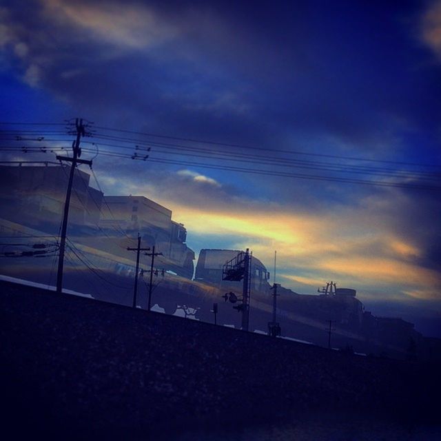 SCENIC VIEW OF DRAMATIC SKY AT SUNSET