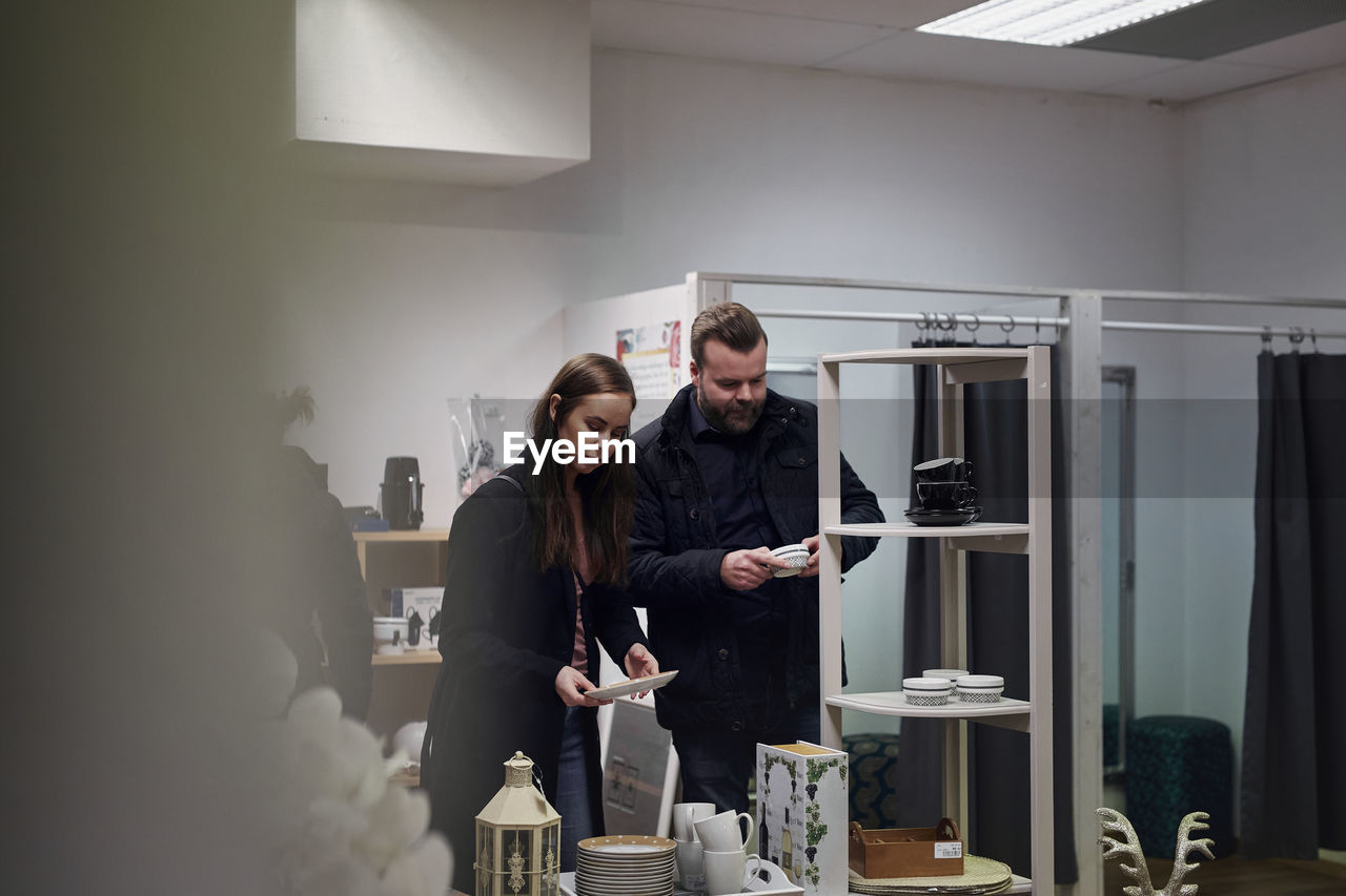 Couple shopping in department store