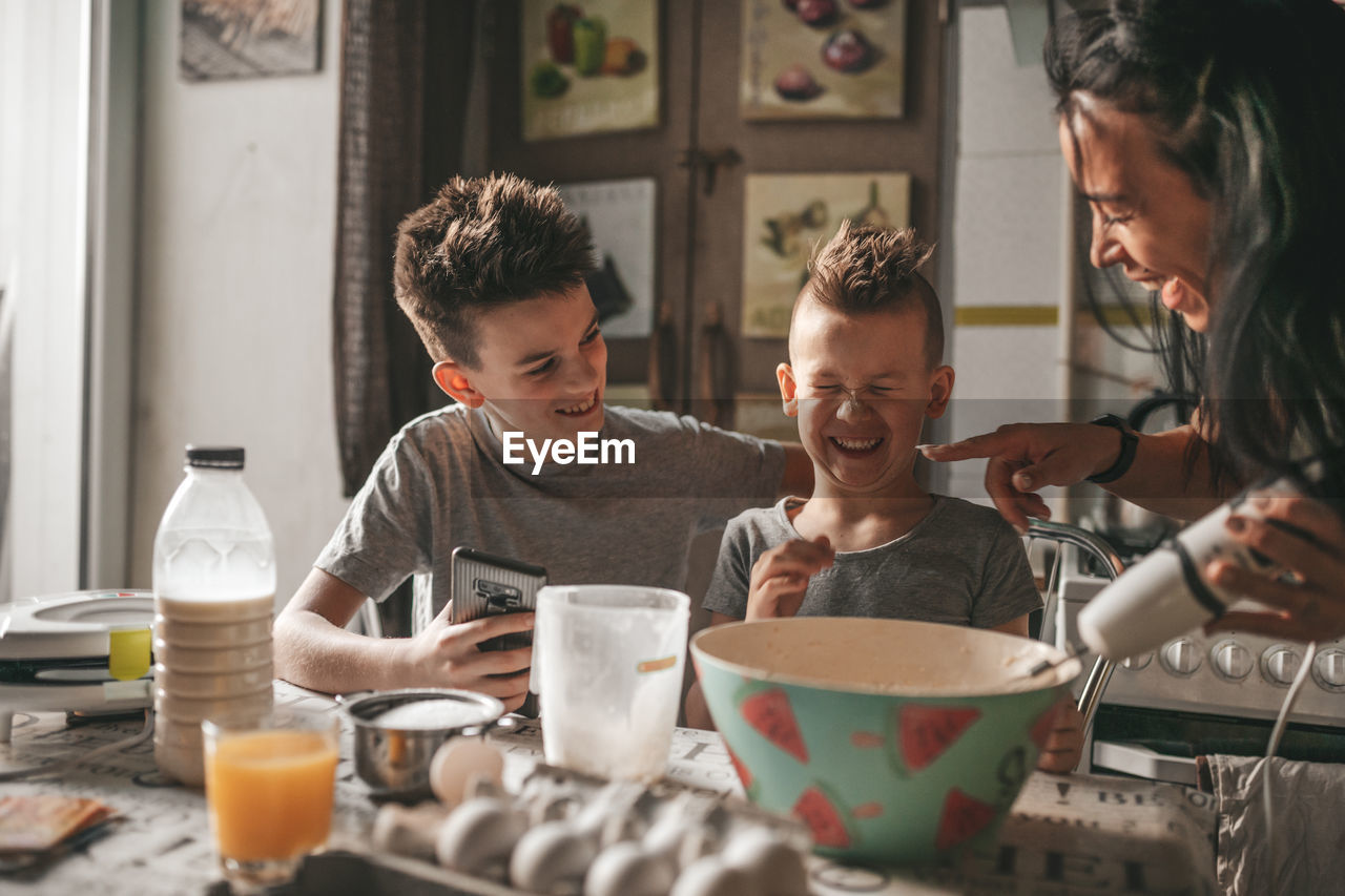 Group of people with food on table