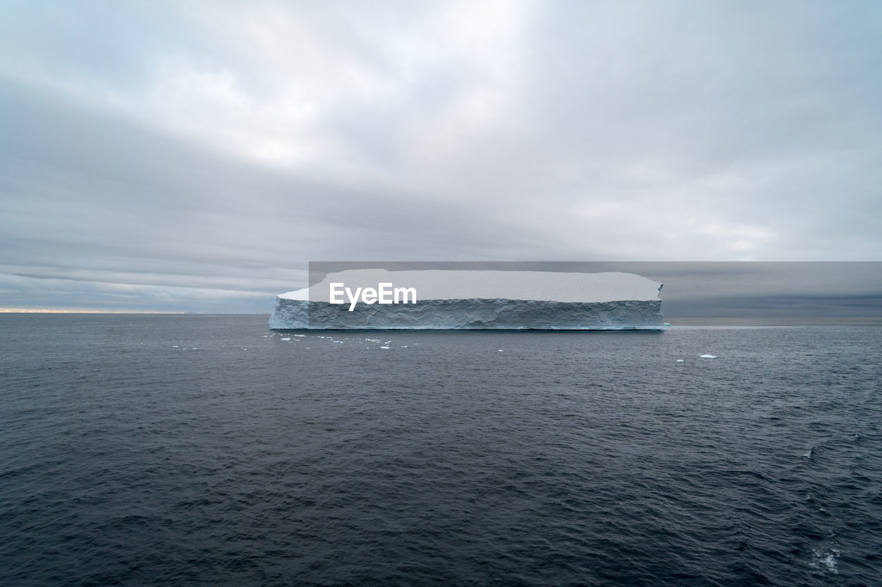 Scenic view of sea against sky during winter