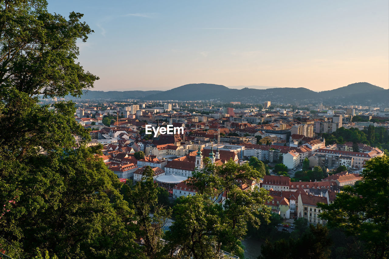 City view over graz from the schlossberg at sunset