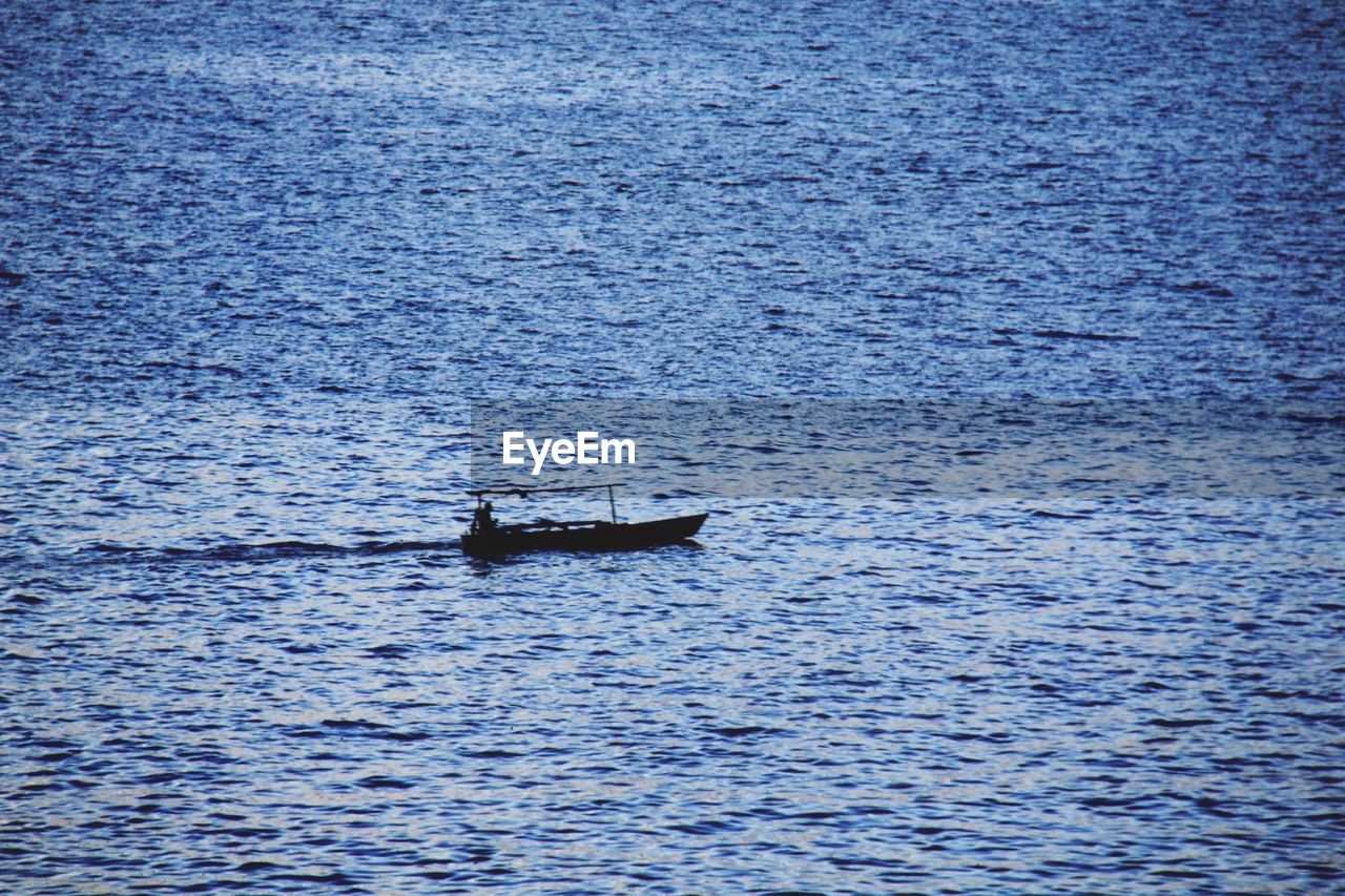 High angle view of boat sailing on river