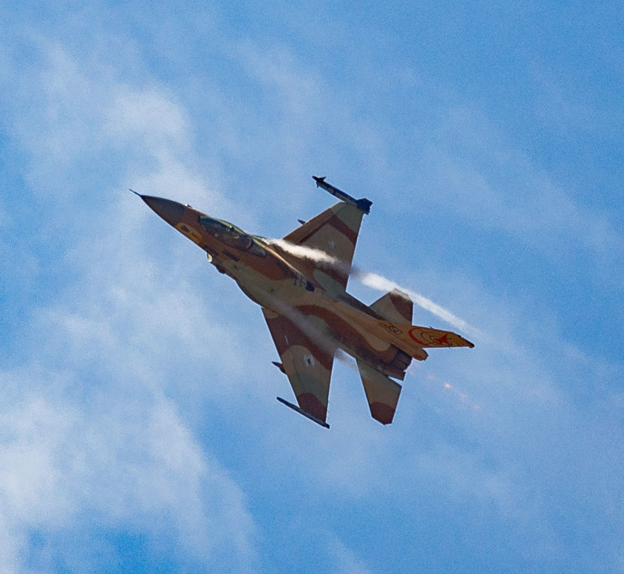 LOW ANGLE VIEW OF AIRPLANE AGAINST SKY