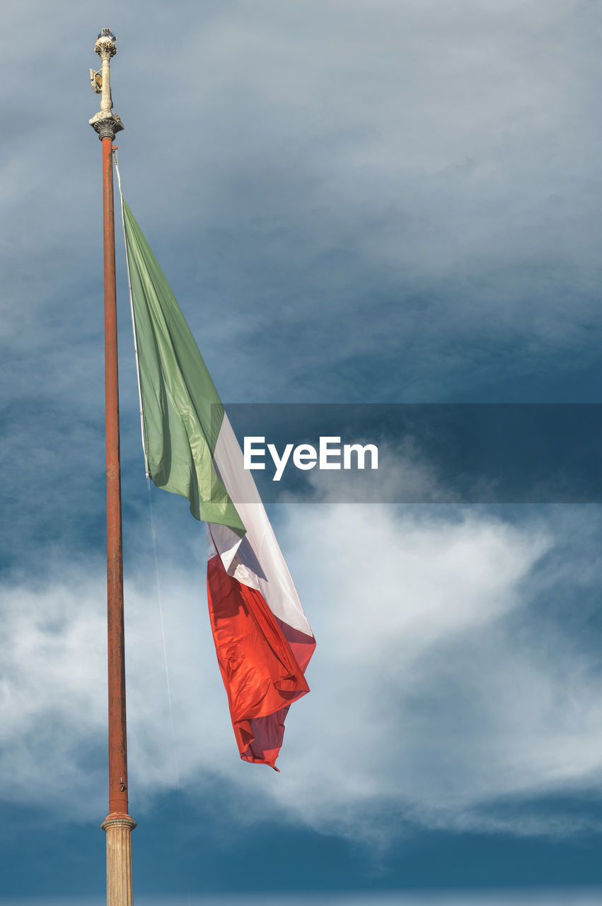 flag, wind, blue, sky, cloud, patriotism, nature, environment, pole, mast, no people, day, red, outdoors, low angle view, copy space