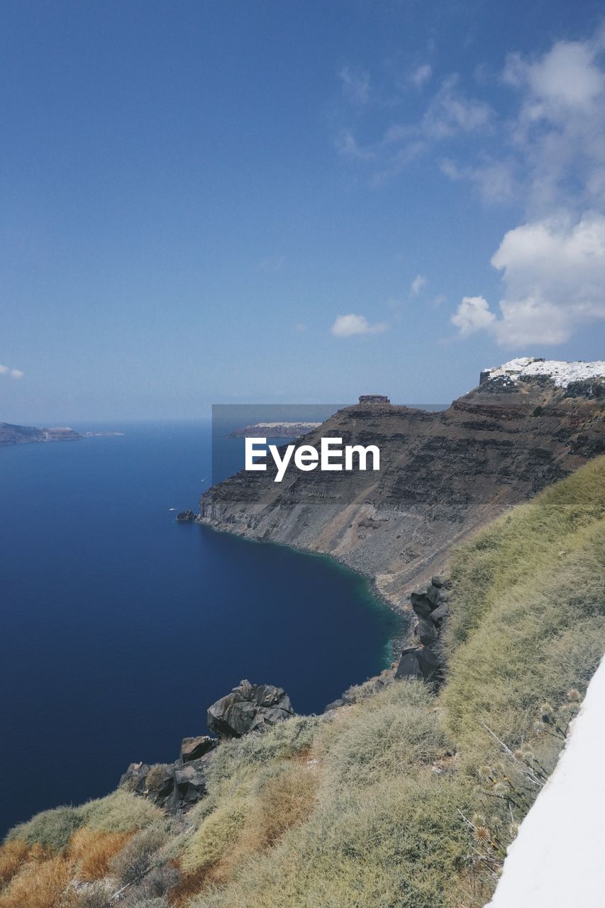water, coast, sea, sky, scenics - nature, nature, cliff, land, beauty in nature, environment, terrain, beach, ocean, landscape, bay, no people, travel destinations, cloud, shore, reservoir, blue, tranquility, body of water, travel, day, mountain, outdoors, coastline, tranquil scene, tourism, horizon, non-urban scene, rock, island