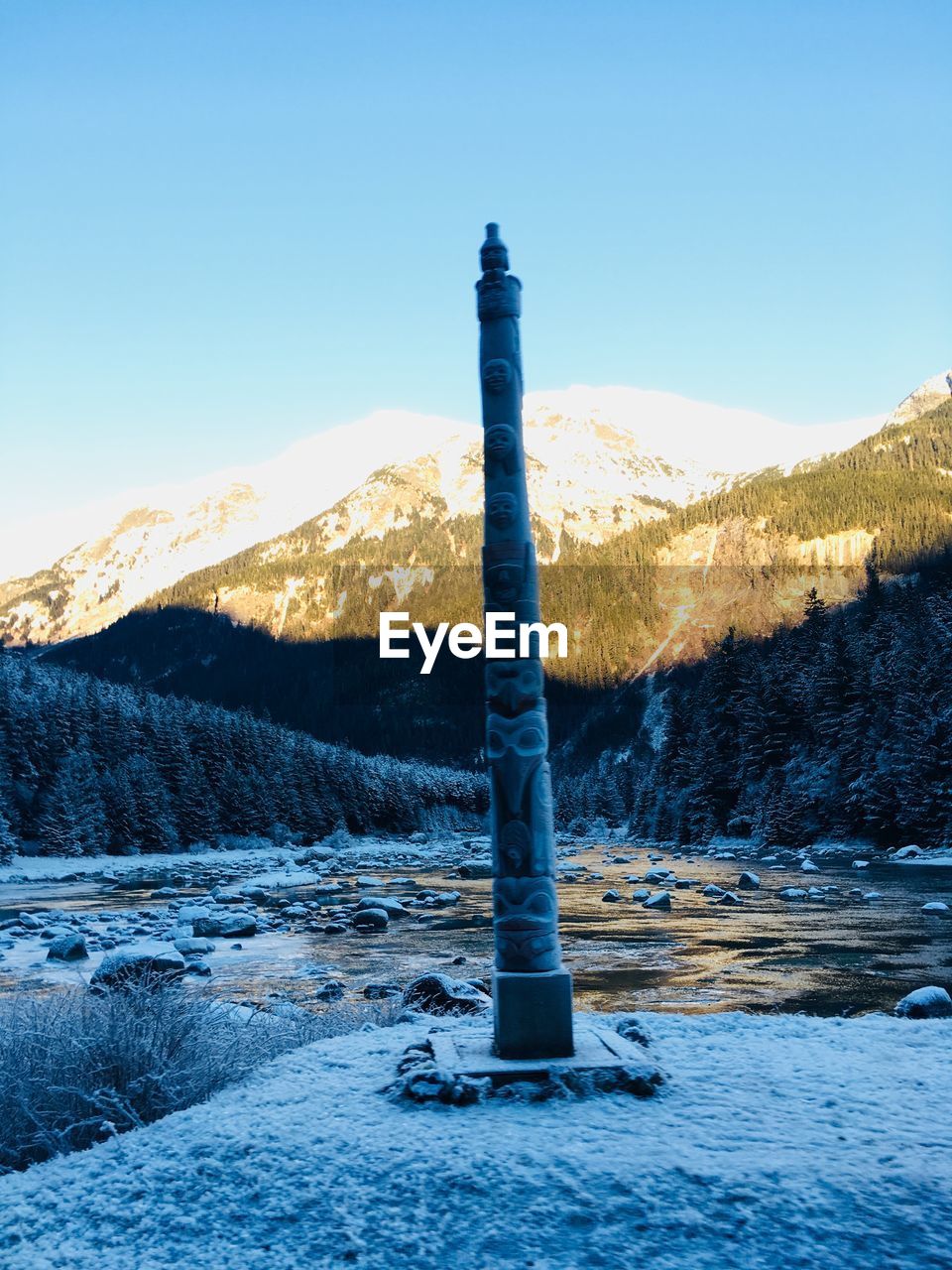 SNOW COVERED LAND AGAINST SKY