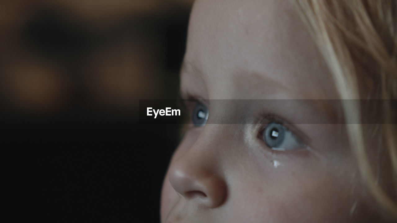 Close-up of girl looking away