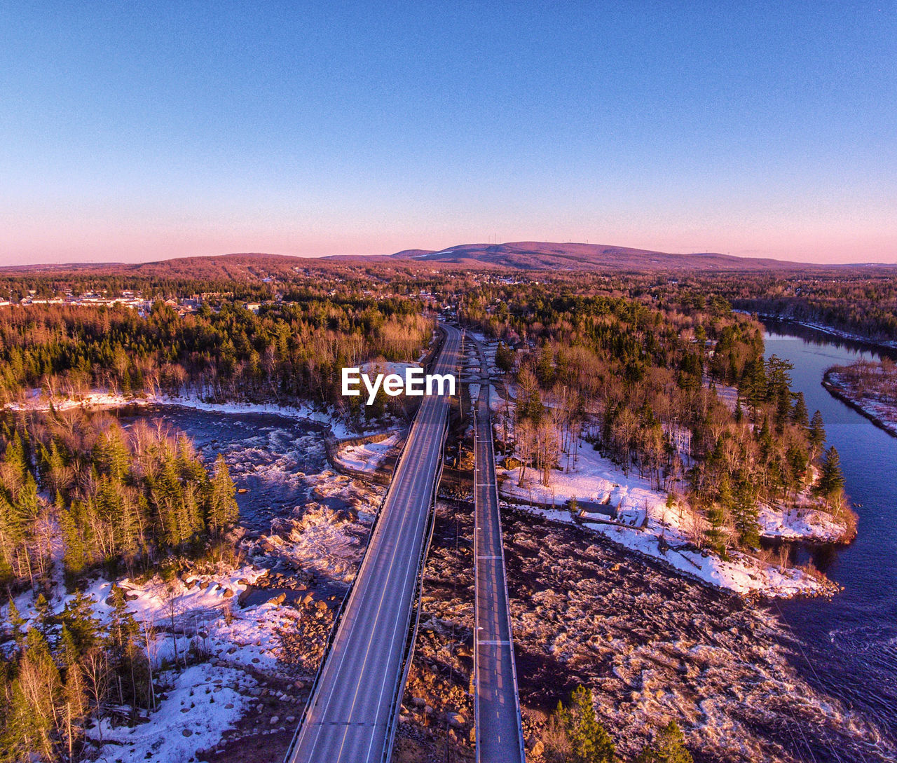 Long straight road high angle aerial rural quebec 