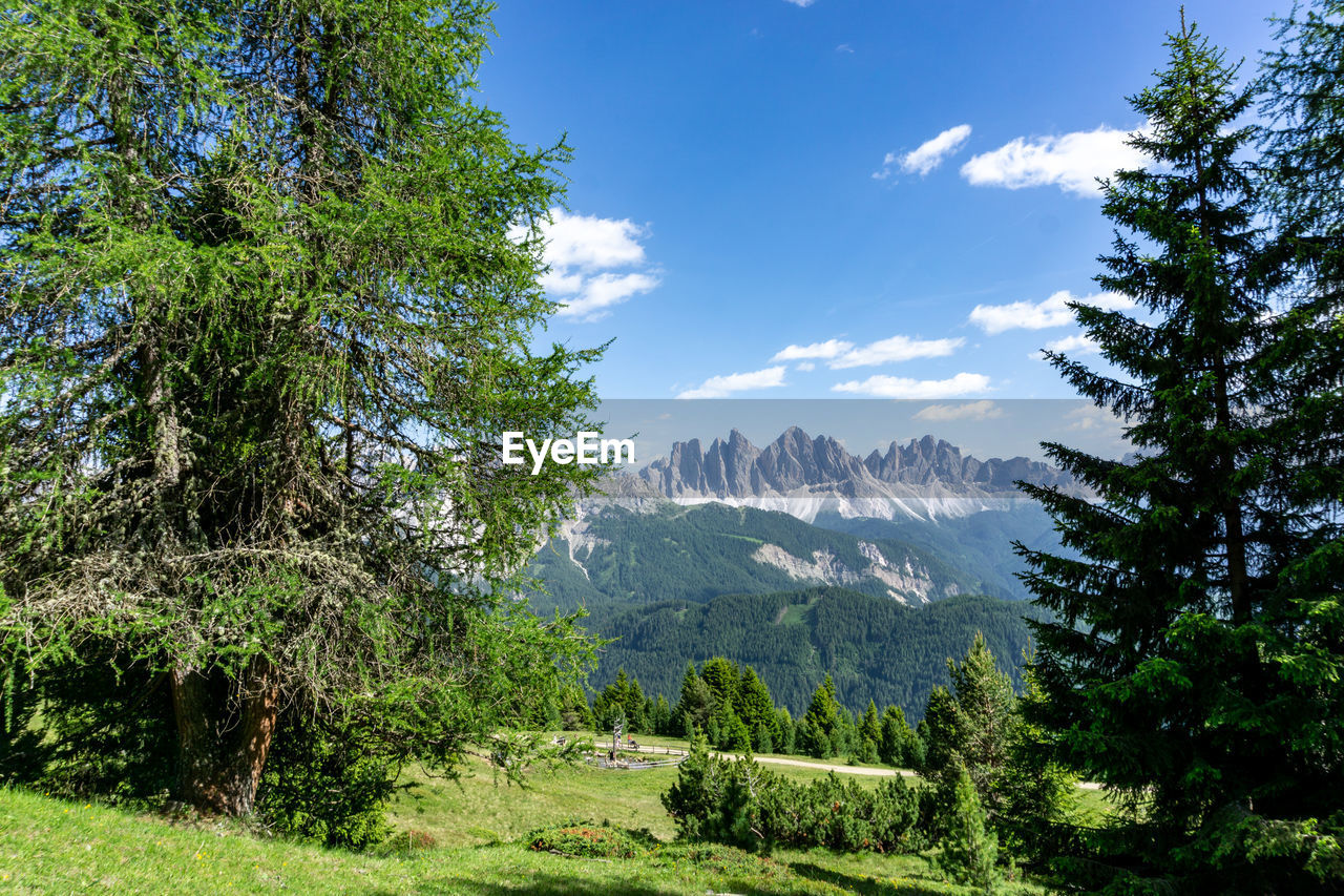 Scenic view of the dolomites mountains against sky
