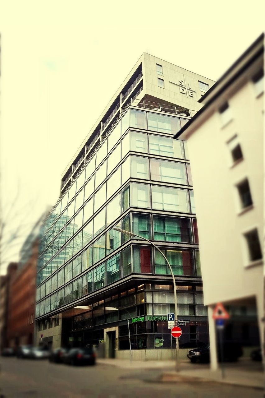 LOW ANGLE VIEW OF MODERN BUILDINGS IN CITY